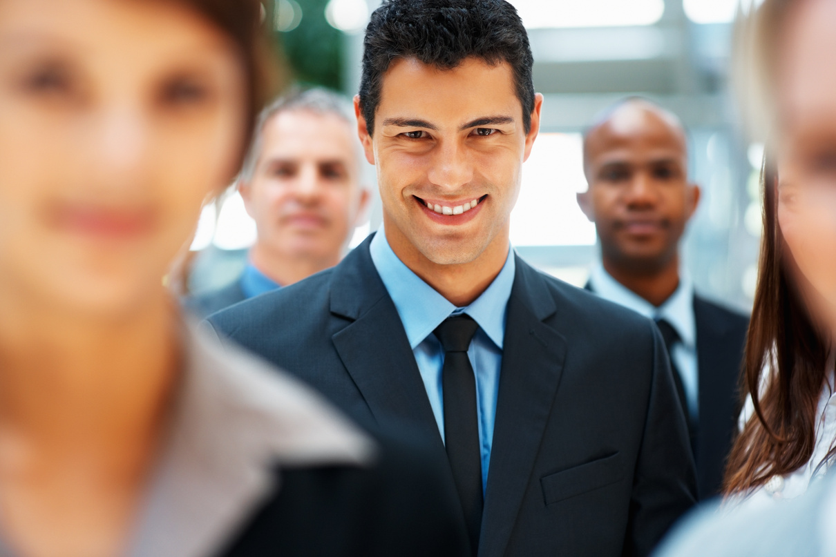 Happy executive with team support